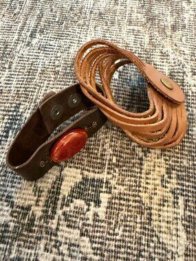 2 Women’s Brown Leather Wrap Bracelets, one with Red Stone Accent